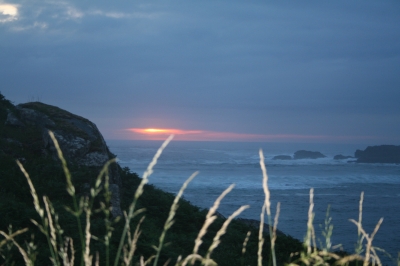 The sun setting over the Atlantic Ocean.